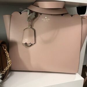 Kate Spade Pink Tote with Gold Accents and Structured Design